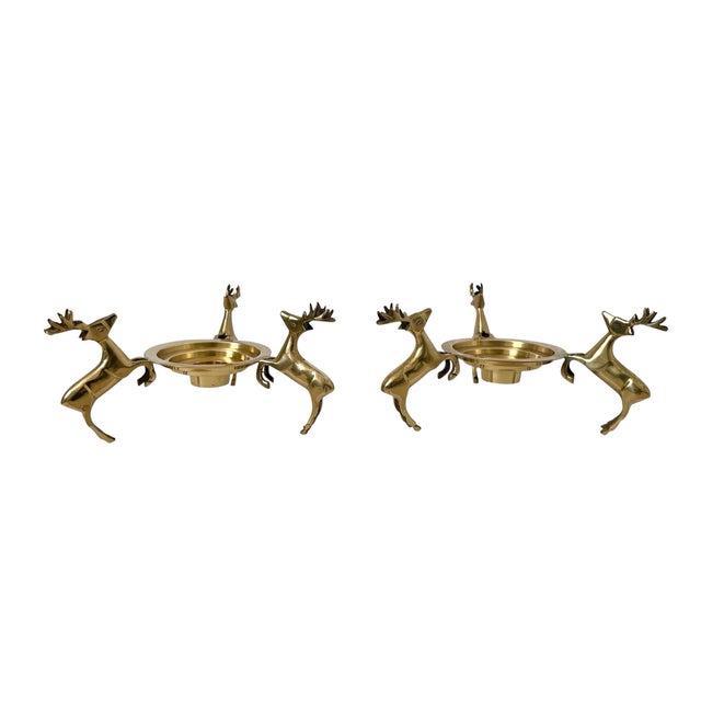 This product is a vintage brass candle holder in the shape of a deer trio, perfect for adding a touch of nostalgia to your...