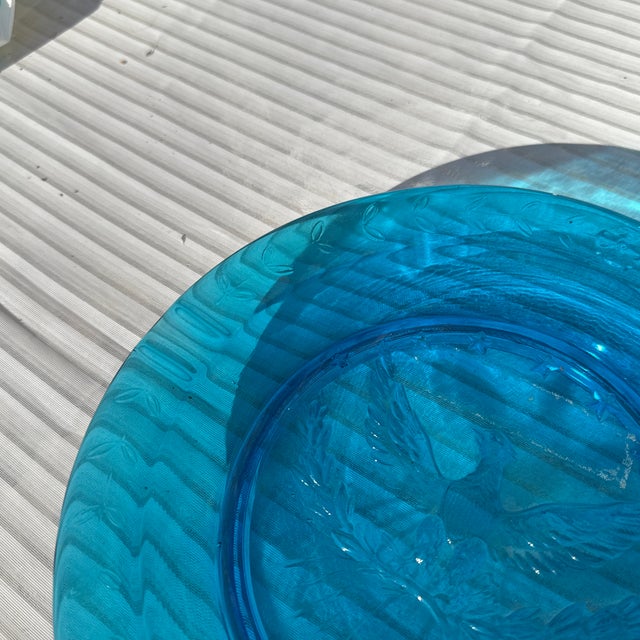 Up for your consideration is this rare jewel tones Blue plate. Perfect to hang on your wall or display as is. This would...