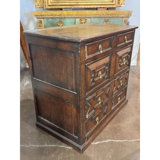 18th century English Charles II carved oak chest of drawers. English Charles II carved oak chests of drawers are known for...