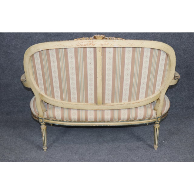 Dimensions: 40.75 inches high x 53.75 inches wide x 30.75 inches deep. Seat Height 17.5 inches Absolutely stunning antique...