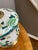 Beautiful Green Floral Lamp with Brass and gold accents. Brass Finial Purchased at the Waterford Wedgewood store in the...