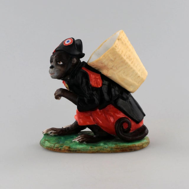 Porcelain pencil holder "Monkey in the shape of Napoleon". H-12cm.