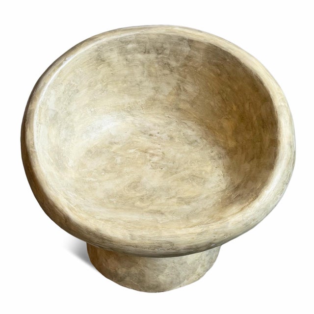 Cement organic modern minimalist style chair perfect for outdoor or indoor use. Round shaped seat and pedestal base....