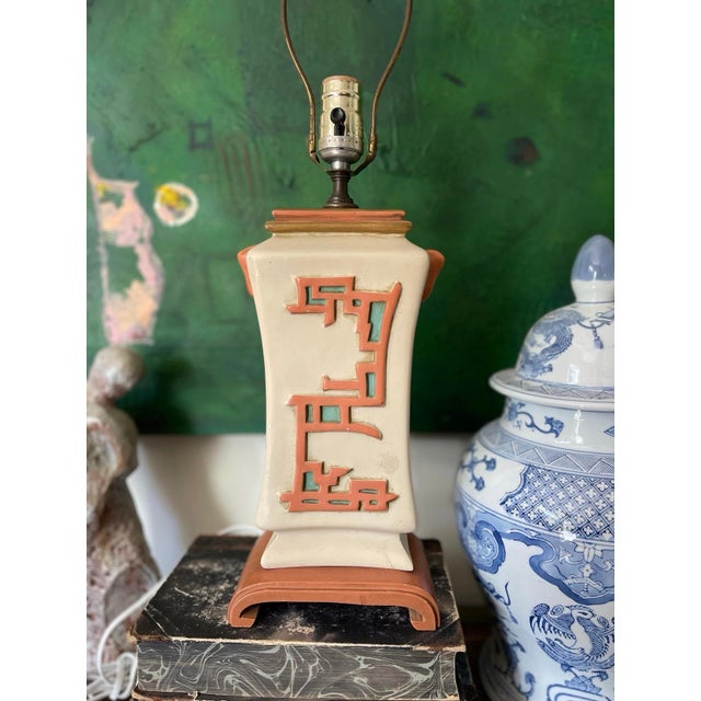 Unique, vintage Asian lamp, with obvious Ming influences, this chalk where lamp presents in a muddy taupe With accents of...