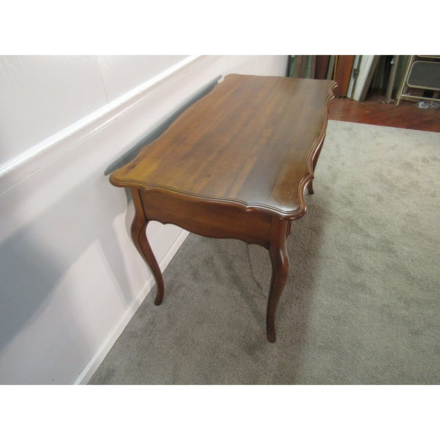 Item 87368: Ethan Allen Counrty French solid maple writing desk. Age: 1990's. Details: Dovetailed drawers. Measurements:...