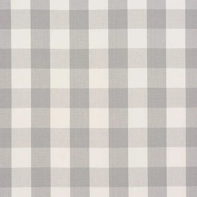 A classic one and a half-inch buffalo check, this woven cotton is a wonderful complement to both prints and plains. Sold...