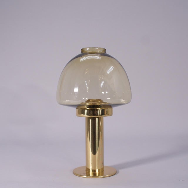 Candleholder in Glass and Brass by Hans-Agne Jakobsson, 1970s, in Very Good conditions. Designed 1970 to 1979 This piece...