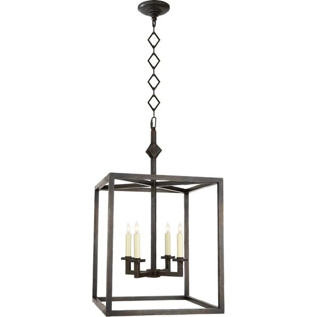 Star Lantern in Aged Iron Designer: J. Randall Powers Canopy: 5.75" Round Mounting: Chain Shade Detail: No Option Socket:...