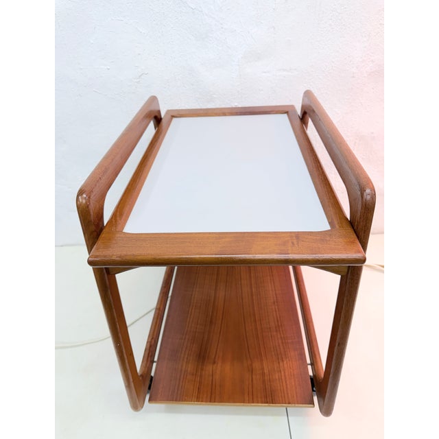 1 1960s serving trolley with removable reversible tray. The design is attributed to Danish designer Henning Wind-Hansen...