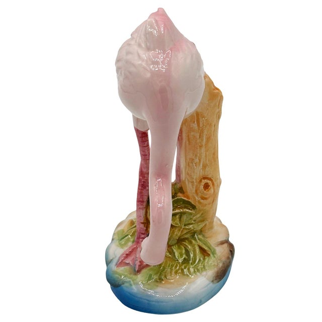 Mid-century pink and green ceramic handsome flamingo tabletop pottery statue by Norcest. The statue features a beautifully...