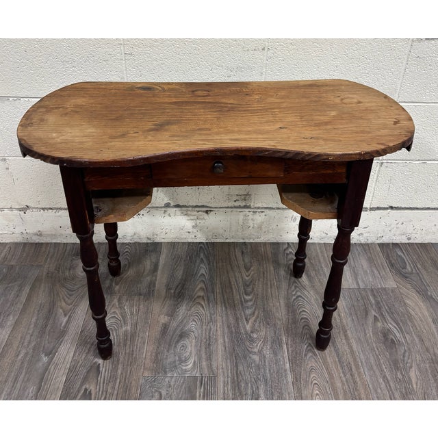 This is a stunning antique American primitive kidney shaped writing desk, console table, or small harvest table, likely...