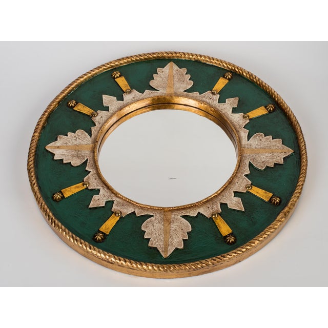 Elevate your space with this striking mid-century wall mirror, a vibrant example of Spanish artisan craftsmanship from...