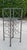 Metal Vintage Giacometti-Style Iron Wine Rack With Glass Shelves For Sale - Image 7 of 8