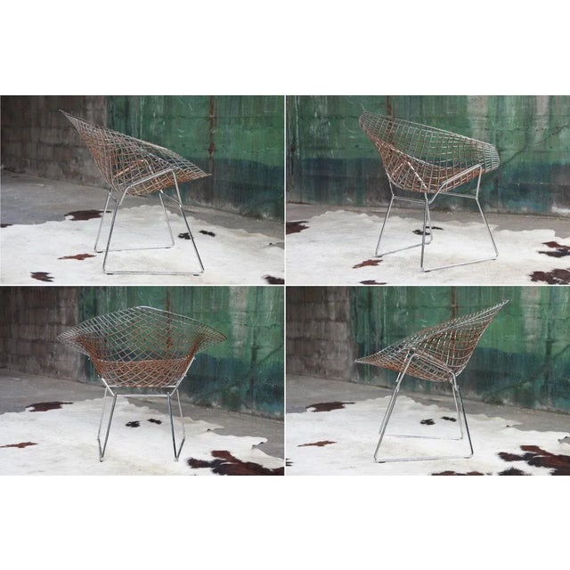 Highlights Vintage from the 1970s Materials: wool, Orange, Chrome, Poppy Overall height: 18 inches Overall width: 22...