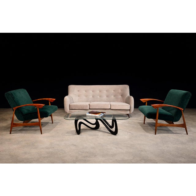 A striking and elegant pair of Brazilian modern armchairs produced by Liceu de Artes e Ofícios in the 1960s. Celebrated...