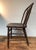 Antique solid wood Windsor chair with turned spindle legs and stretchers with a farmhouse vibe. Made in USA in Camden NJ...