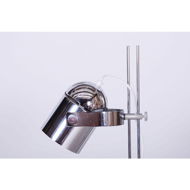 Designer: Stanislav Indra Maker: Combi Lux This distinctive adjustable desk lamp originating from the 1970s from...