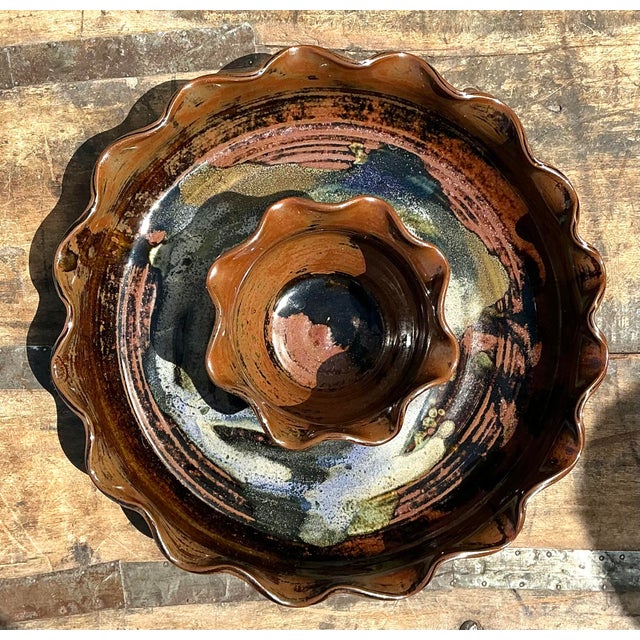 This exquisite hand-thrown studio pottery chip and dip server is a captivating example of the organic, earthy aesthetic of...