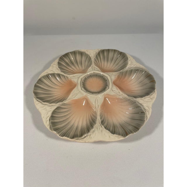 A stunning hand crafted ceramic Majolica Sarreguemines Oyster Plate made in northern France. Circa 1920s. Maker's marks...