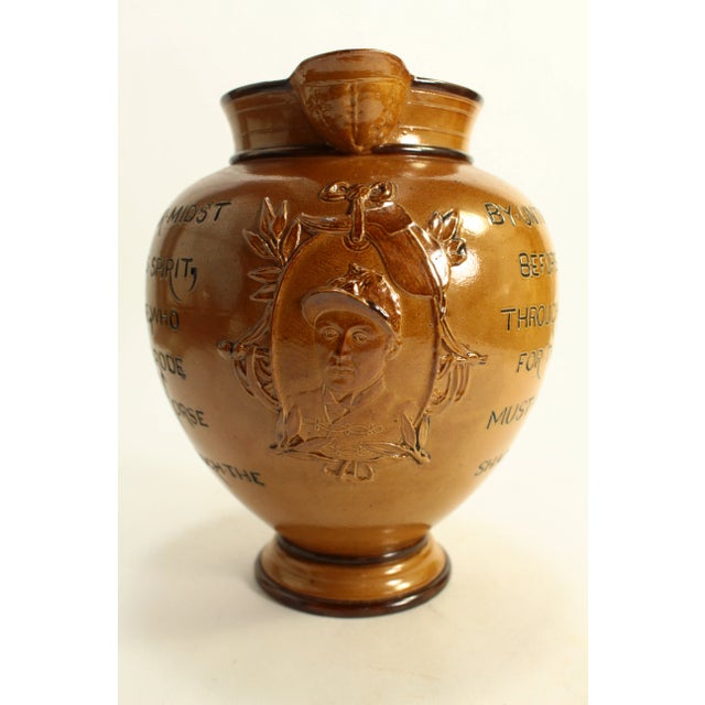 A very unique and rare equestrian themed pitcher Custom made by Doulton Lambeth, salt-glazed commemorative Motto-type jug...