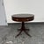 Design Plus Gallery presents a Late 20 Century Regency Style Leather Top Drum Table. This round drum table has a leather...