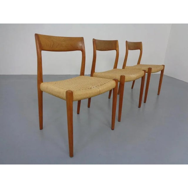 Teak chair with papercord seating. Model 77. Designed by Niels O. Möller. I have official proof of authenticity such as...