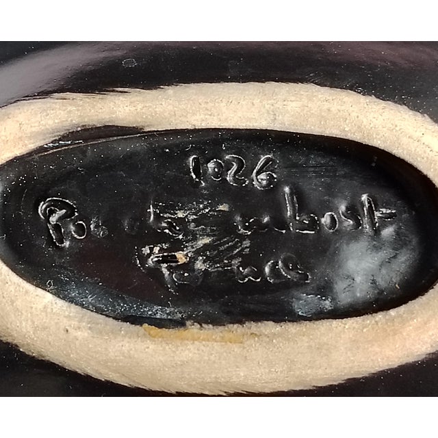 Pair of ceramic trinket dishes or serving dishes depicting mussel or oyster shells with iridescent and pearly reflections...