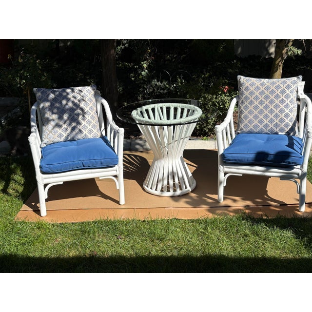 This striking three-piece lounge set features an iconic "Sheaf of Wheat" hourglass accent table with a 1/2-inch-thick...