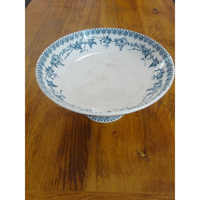 Antique earthenware, Lyonnais pattern from the H. Boulenger factory, dating from between 1880 and 1910. Creamy white...