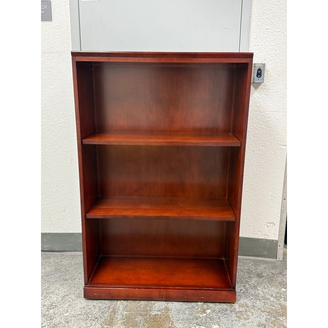 Design Plus Gallery presents a Transitional Bookcase. The bookcase has a transitional profile with straight lines, a...