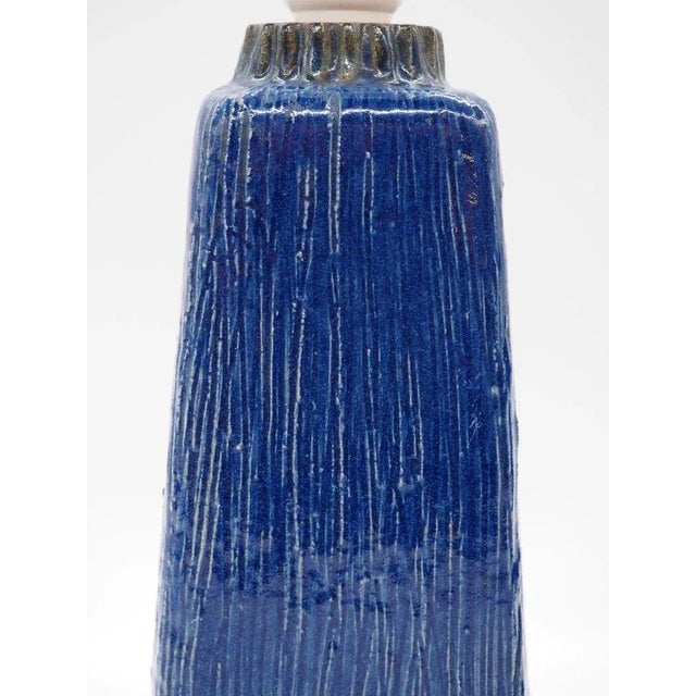 A pair of beautiful lamps in blue ceramic from Fischer Stoneware. The texture of the glaze makes them extra vibrant. This...