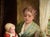 Textile Woman With Two Children in Red - Dutch Style Interior Scene in Oil on Canvas by Joseph Tomanek For Sale - Image 7 of 9