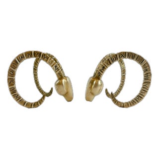 1970's Hollywood Regency Dolbi Cashier Brass Ibex Sculptural Heads - A Pair For Sale