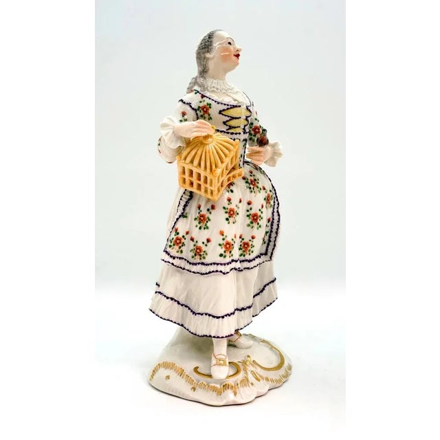Very rare figurine from the former manufacturer frankenthal germany. The lady, dressed in rococo style: white dress with...