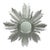 Mid-20th Century Sunburst Mirror crafted from carved wood and finished in silvered patina. The design radiates from a...