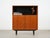 The bookcase was made in the 1970s, Danish production. The structure is covered with teak veneer. The legs are made of...