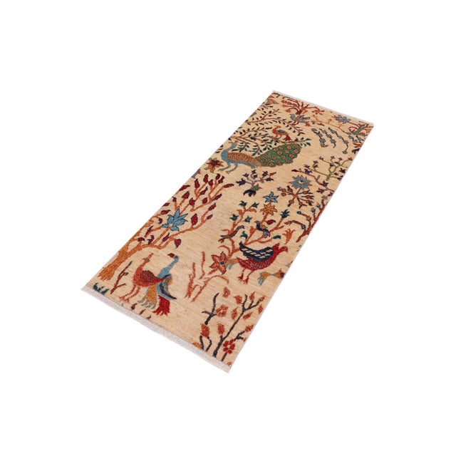 "Enhance the ambiance of your home with this magnificent Persian-influenced Turkish hand-knotted rug made by skilled...
