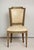 Vintage set of six Louis XVI style painted dining room chairs on tapered legs.