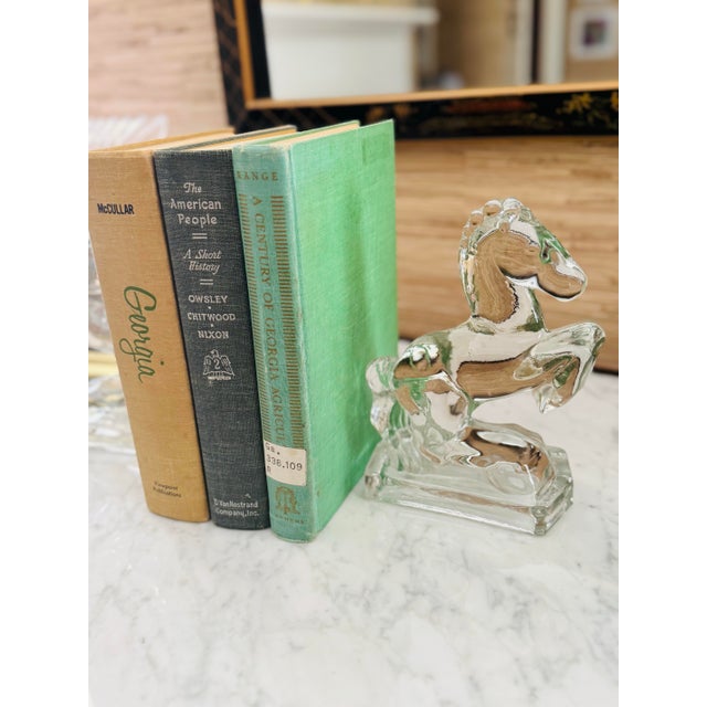Gorgeous heavy pressed glass horse bookends by LE Smith. Beautiful piece of mid century charm. Perfect for the horse...