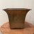Solid brass square waste can/planter with different Asian depictions with natural patina. The can has a graceful curve...