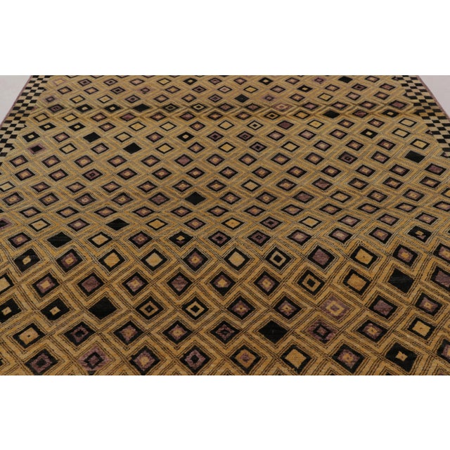This 8 x 9 Moroccon-Inspired Rug from Rug & Kilim’s Collection features a hypnotic, all-over pattern of interlocking...