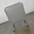 Gray Modern Gray Faux Leather Modified Parsons Style Armed Accent Chair on Casters For Sale - Image 8 of 17