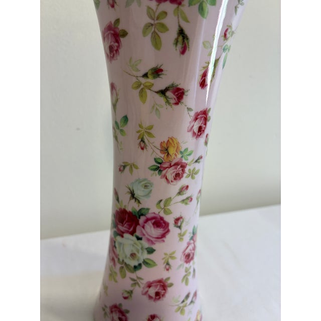 A charming vintage porcelain vase from Godinger's Antique Reflections collection, featuring an elegant trumpet silhouette...