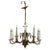 An antique Classical French Empire style chandelier offers cast bronze construction with ebonized bodice having twelve...