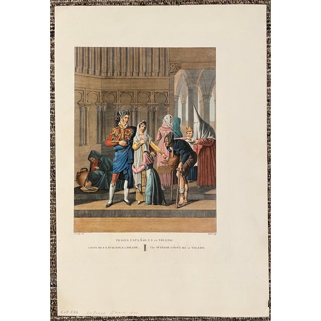 1802 hand colored engraving of various dress one would find on the citizens of Toledo, Spain. Sheet size: 16.5 x 11.5...