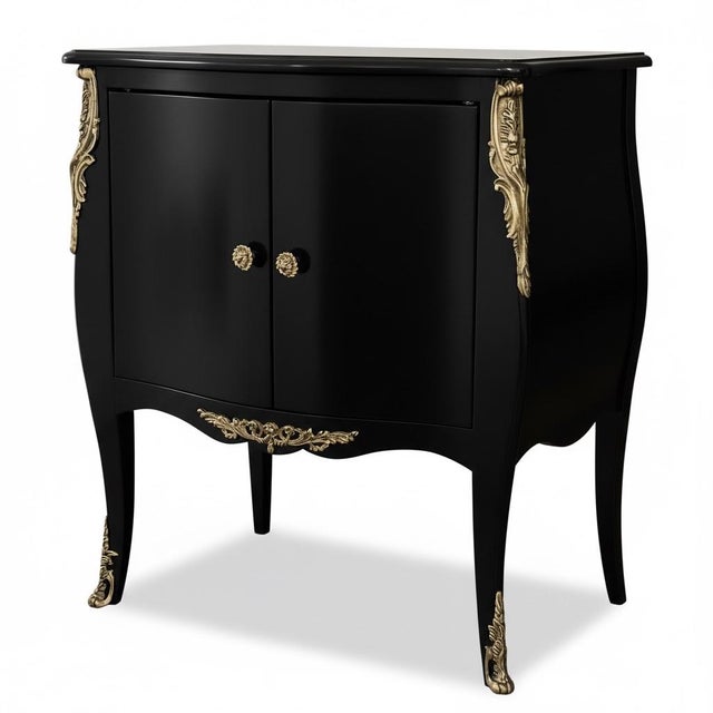This is a French Louis XV Style black lacquered cabinet attributed to Bodart. It dates to the late 1970s. It has gilt...