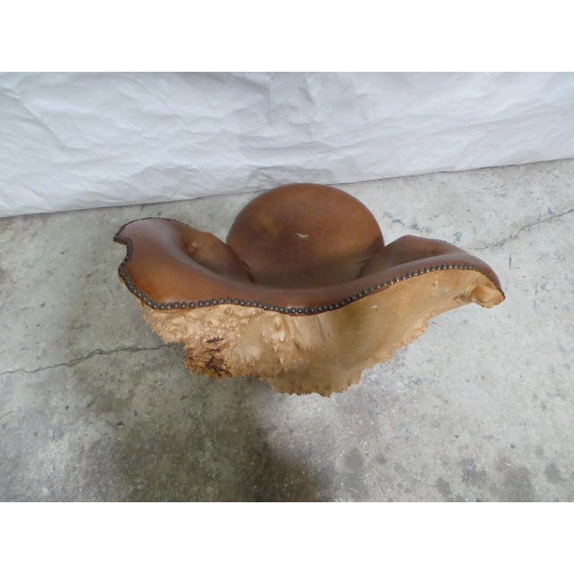 This is a ONE of a kind Burl Chair and its Large for anything Burl wood. its hollowed out inside so it is Not supper heavy.