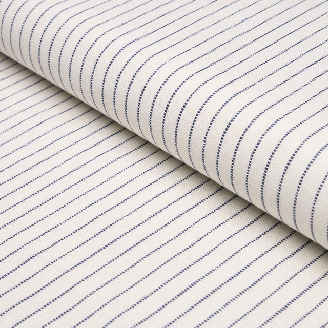 Featuring slightly irregular narrow stripes, Theo Stripe is a soft, lightweight woven made of 100% linen. Subtle texture...
