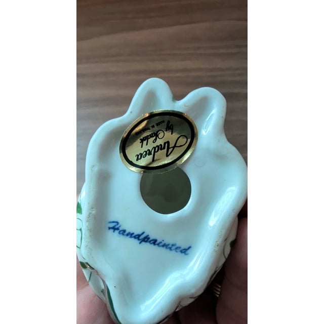 Add a touch of timeless elegance to your collection with this vintage Herend-style rabbit figurine by Andrea by Sadek....