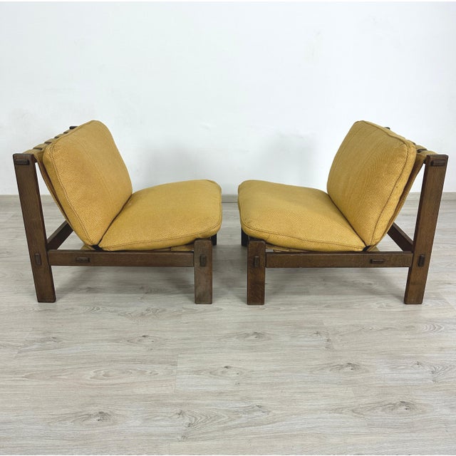 Dimensions: H 27.5” x W 26.3” x D 31.5” x SH 17.5” Pair of Vintage Brutalist lounge chairs designed by Carl Straub in the...